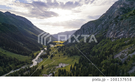 Beautiful sunset with a view of the green gorge Beautiful sunset with a view of the green gorge 108137658