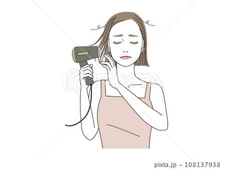髪をドライヤーで乾かしたら静電気が起きて困っている女性 108137938