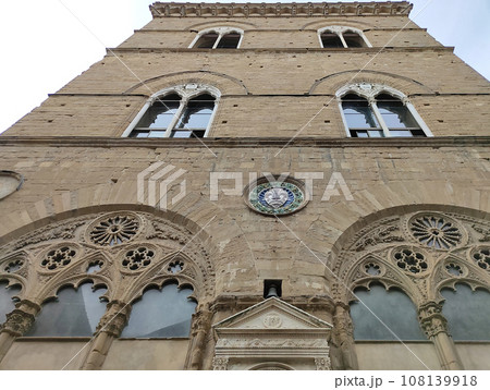 Colorful historic streets of Florence, Italy. Narrow old street, building's facade, brick walls. 108139918