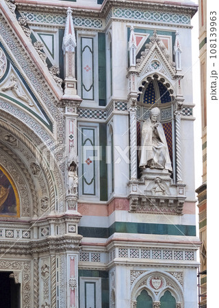 Details of the exterior of the di Santa Maria del Fiore or Cathedral of Saint Mary of the Flower - the main church of Florence, Tuscany, Italy. Details of the exterior of the di Santa Maria del Fiore or Cathedral of Saint Mary of the Flower - the main church of Florence, Tuscany, Italy. 108139963