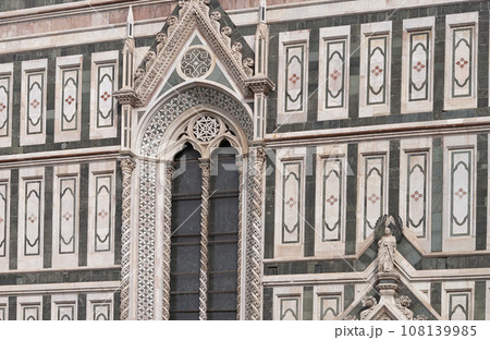 Details of the exterior of the di Santa Maria del Fiore or Cathedral of Saint Mary of the Flower - the main church of Florence, Tuscany, Italy. Details of the exterior of the di Santa Maria del Fiore or Cathedral of Saint Mary of the Flower - the main church of Florence, Tuscany, Italy. 108139985
