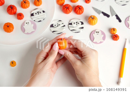 Sculpt halloween decor for cupcakes from mastic\sugar paste. DIY. Hand made decor 108149391