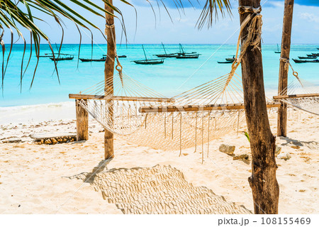 beautiful seascape with hammock on a beach 108155469