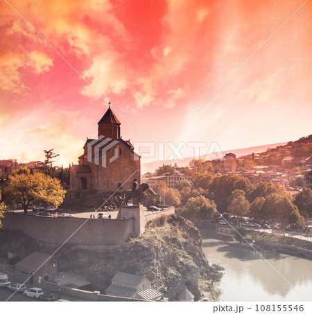 cityscape with Metekhi and Tbilisi at sunset 108155546