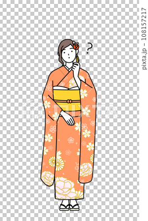 A woman in a long-sleeved kimono tilts her head in question, at a New Year's shrine visit, a coming-of-age ceremony, a graduation ceremony, a wedding, etc. 108157217