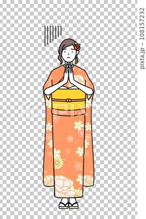A woman in a long-sleeved kimono apologizes by putting her hands together in front of her body, at New Year's shrine visits, coming-of-age ceremonies, graduation ceremonies, weddings, etc. 108157232