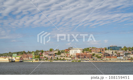 cityscape panorama of Alton in Illinois on a shore of the Mississippi River, a view from the Missouri shore 108159451