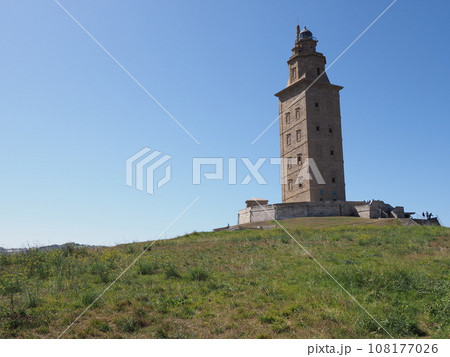 Green field and tower of Hercules in A Coruna city at Galicia, Spain 108177026