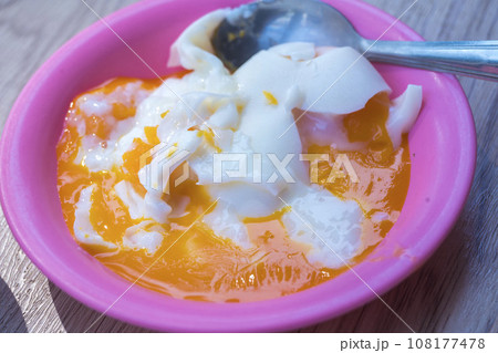 Three quarters cooked egg on a plate Three quarters cooked egg on a plate 108177478
