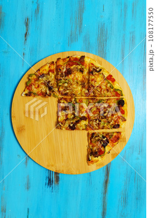 Homemade St. Louis Style Pepperoni Pizza. The tavern cut. Vertical photo. Flat lay 108177550