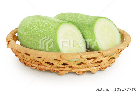 zucchini or marrow in a wicker basket isolated on white background with full depth of field 108177780