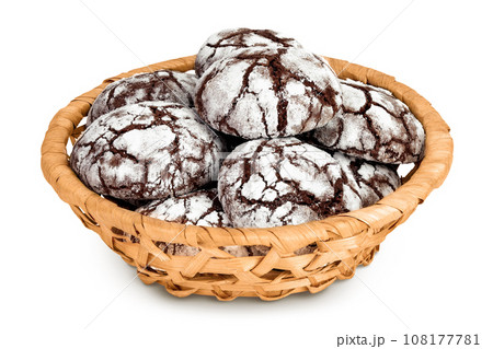 Chocolate brownie cookie in a wicker basket isolated on white background with full depth of field 108177781
