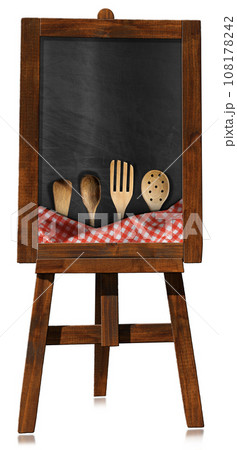 Empty Blackboard with Wooden Easel and Wooden Kitchen Utensils 108178242