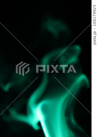 Green lines, green smoke on a dark background, colourful abstract, green fog, minimalism, line of light 108179925