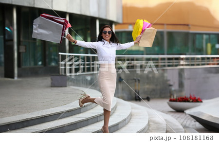 Happy lady in sunglasses Happy lady in sunglasses 108181168