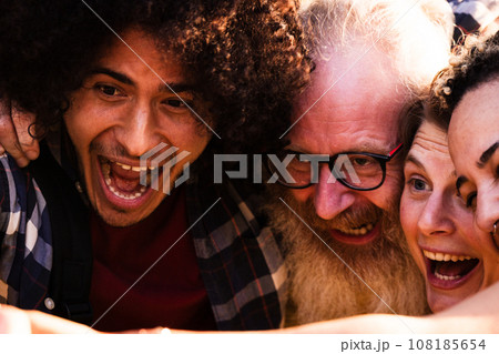 Playful Melting Pot Diverse Friends Share a Joyful Selfie Moment Playful Melting Pot Diverse Friends Share a Joyful Selfie Moment 108185654
