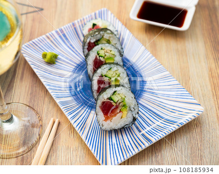Japanese roll futomaki with soy sauces 108185934