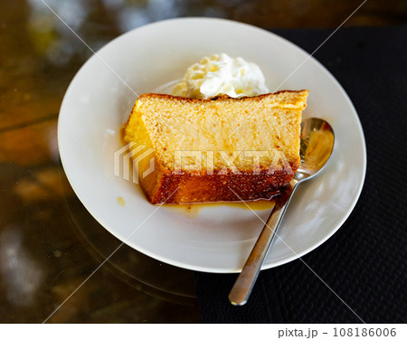 delectable pudding served elegantly delectable pudding served elegantly 108186006