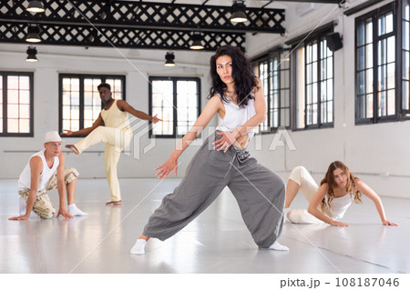 Asian woman studying movement of contemporary dance Asian woman studying movement of contemporary dance 108187046