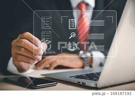Professional businessman signs electronic documents on virtual screen using stylus pen. electronic signature concept, efficient business management, technological advancements. Agreement is confirmed. 108187192