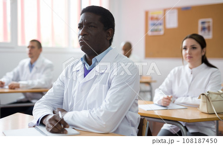 African american doctor on lecture within refresher course African american doctor on lecture within refresher course 108187450