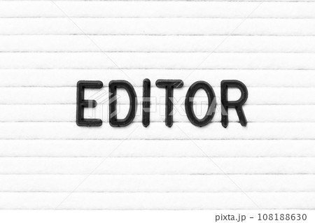 Black color letter in word editor on white felt board background Black color letter in word editor on white felt board background 108188630