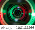 Video camera lens lit by red and green color light 108188866