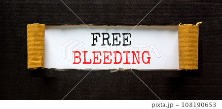 Free bleeding symbol. Concept words Free bleeding on beautiful white paper. Beautiful black table black background. Gen Z, motivational, freedom free bleeding concept. Copy space. Free bleeding symbol. Concept words Free bleeding on beautiful white paper. Beautiful black table black background. Gen Z, motivational, freedom free bleeding concept. Copy space. 108190653