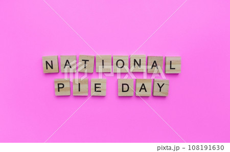 January 23, National Pie day, minimalistic banner with the inscription in wooden letters January 23, National Pie day, minimalistic banner with the inscription in wooden letters 108191630