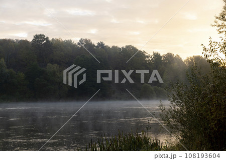 Small fog on the river in autumn 108193604