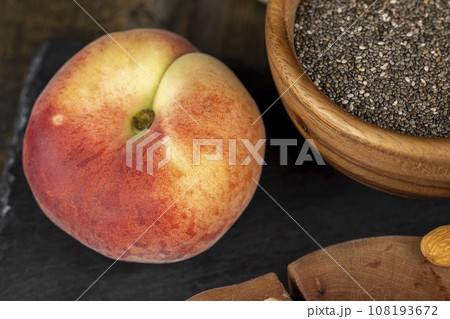 ripe delicious peaches on the table, making desserts 108193672