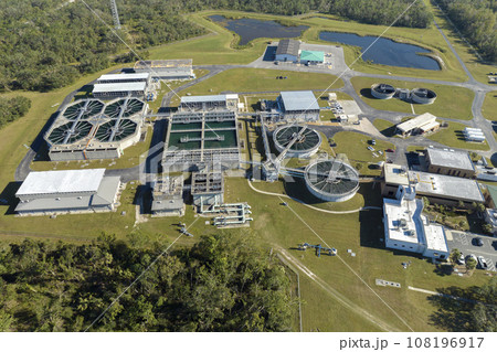 Aerial view of water treatment factory at city wastewater cleaning facility. Purification process of removing undesirable chemicals, suspended solids and gases from contaminated liquid 108196917