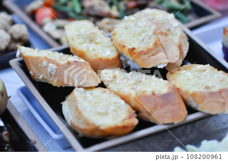 garlic bread, bread or toast with butter topping garlic bread, bread or toast with butter topping 108200961