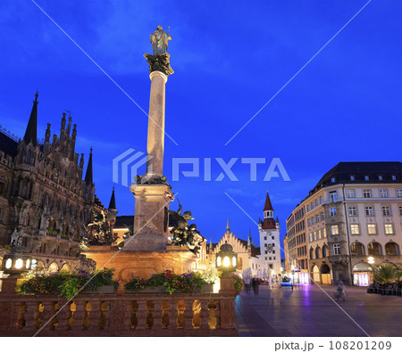 Mary's Square illuminated at dusk with the Old City Hall on the background in Munich, Germany 108201209