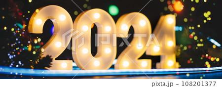 New Year 2024 - Celebration - Abstract Defocused Lights. Beautiful Panoramic web banner New Year 2024 - Celebration - Abstract Defocused Lights. Beautiful Panoramic web banner 108201377