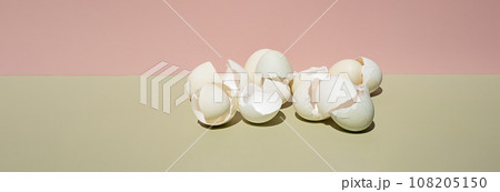 Cracked eggs shell. Easter creative still life. Cracked eggs shell. Easter creative still life. 108205150