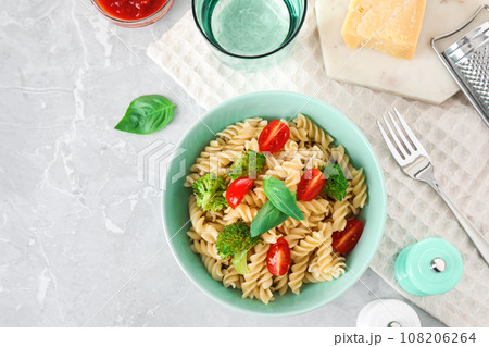 Flat lay composition with tasty pasta on light grey marble table Flat lay composition with tasty pasta on light grey marble table 108206264