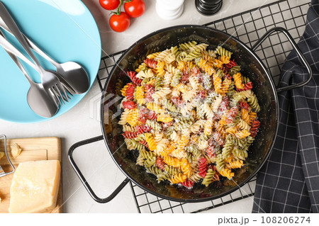 Flat lay composition with tasty pasta on light grey marble table 108206274