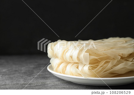 Block of rice noodles on grey table Block of rice noodles on grey table 108206529