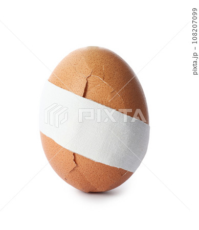 Cracked egg with sticking plaster isolated on white 108207099