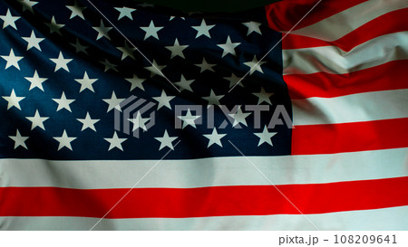 Close up of Waving American Flag on Black Background, Super Slow Motion, Filmed on High Speed Cinematic Camera at 1000 FPS Close up of Waving American Flag on Black Background, Super Slow Motion, Filmed on High Speed Cinematic Camera at 1000 FPS 108209641
