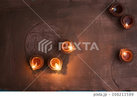Burning diya on Happy Diwali, background for light festival of India 108211589