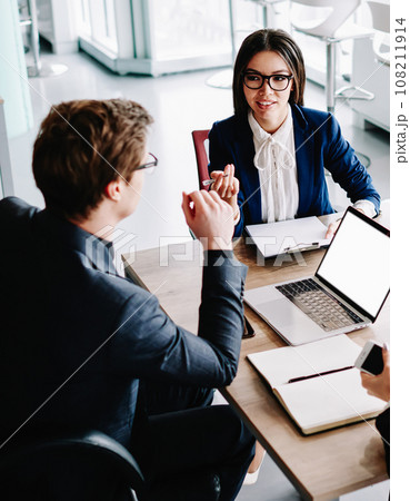 group of skilled business partners discussing statement for project share creative ideas in office 108211914