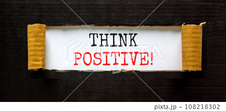 Think positive symbol. Concept words Think positive on beautiful white paper. Beautiful black table black background. Business, motivational think positive thinking concept. Copy space. 108218302