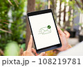 Hand holding digital tablet with showing email send complete. 108219781