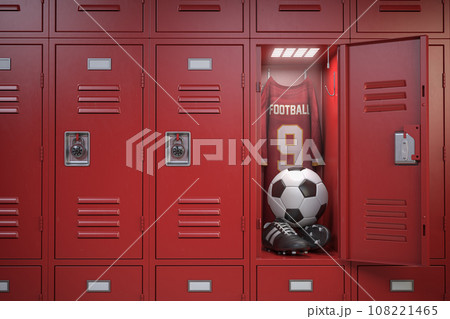 Football accesoires in locker rrom. Soccer ball, shirt and boots in a club wardrobe. 108221465