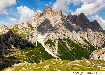 Dolomite mountains with rocky summits on sunny autumn day 108223297