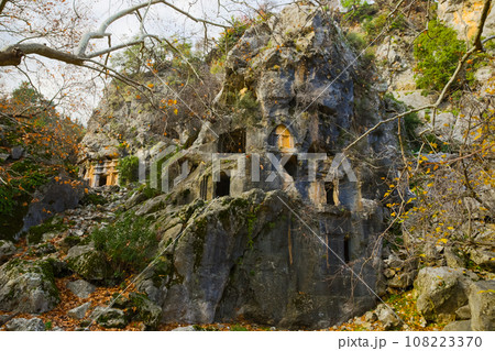 Lycian rock-cut tombs in ancient Pinara, Turkey 108223370