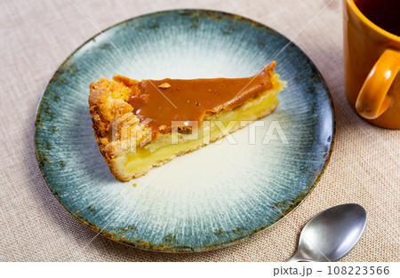 Piece of caramel apple pie served in a plate 108223566