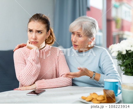 Sad woman and her mother 108223914